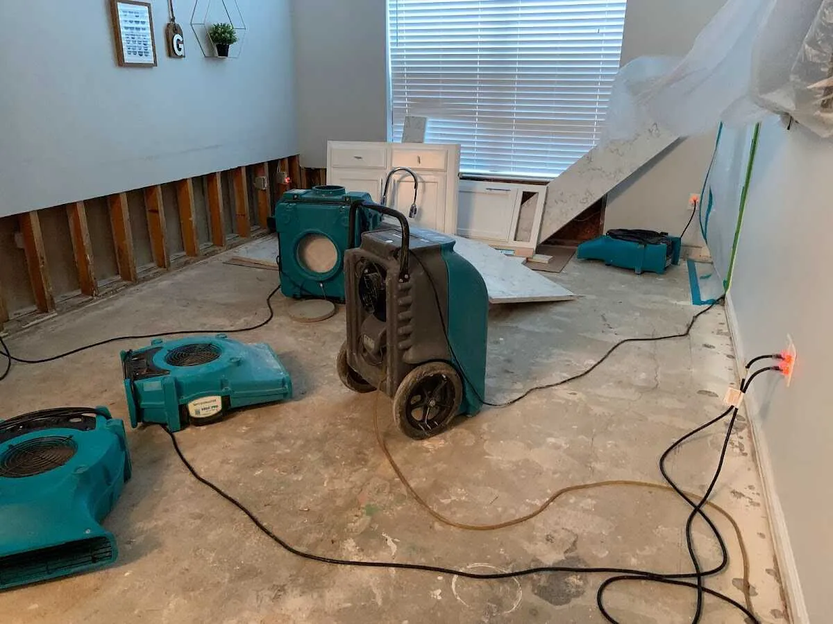 Dehumidifier in flood-cut room for Water Damage Restoration in Bellair-Meadowbrook Terrace